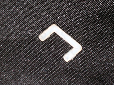 Clutch Release Arm Retaining Staple for Bearing Location